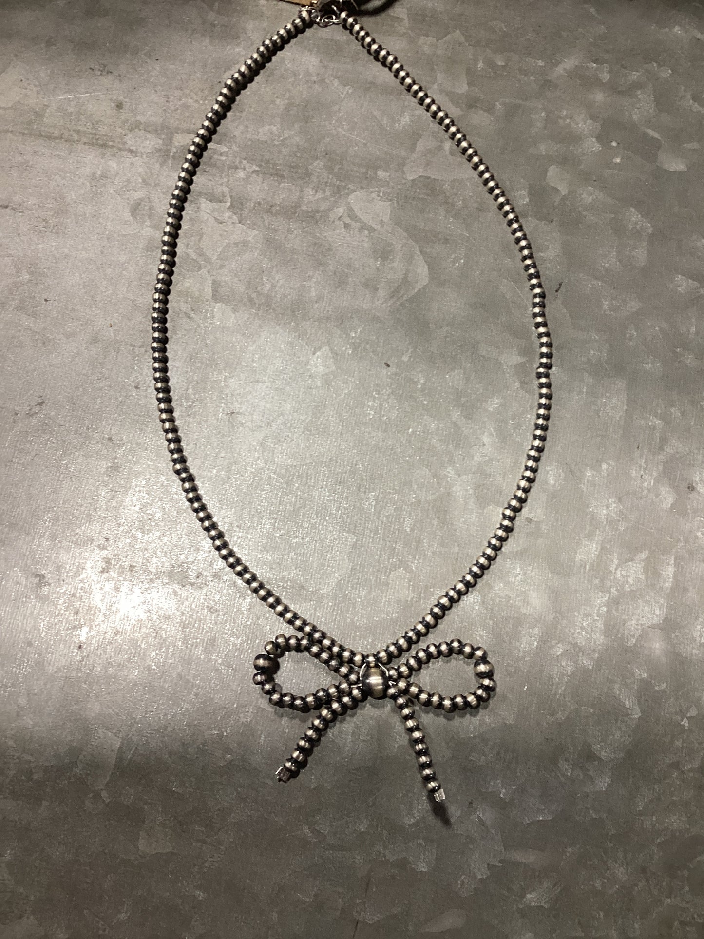 Navajo Pearl Sterling Silver Bow Necklace